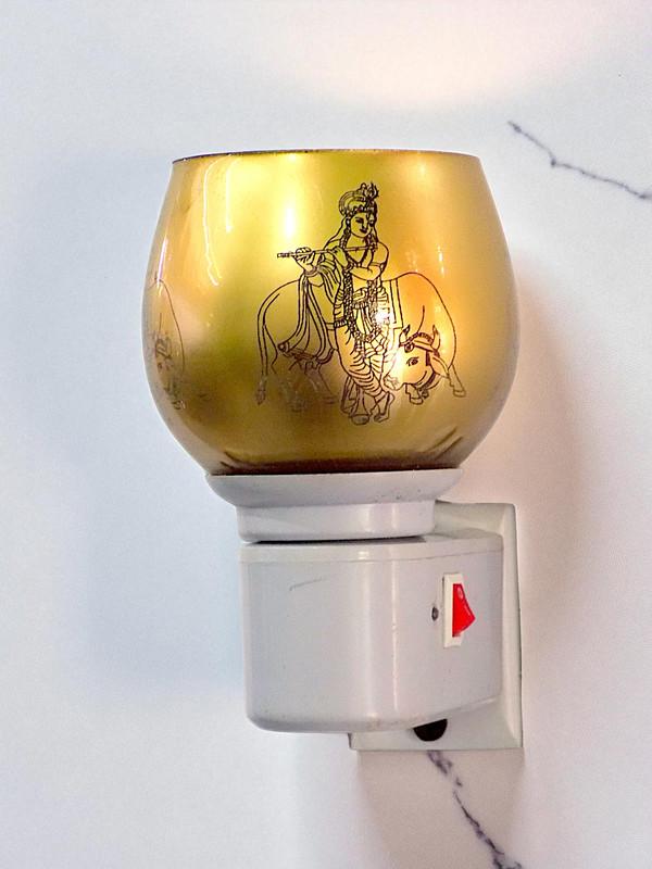 Electric Kapoor Dani with Aroma Oil Diffuser – Gold Krishna Design Camphor Burner for Home & Pooja Room | Plug-in Air Freshener with Blueberry Fragrance Oil | Room Freshener & Home Décor